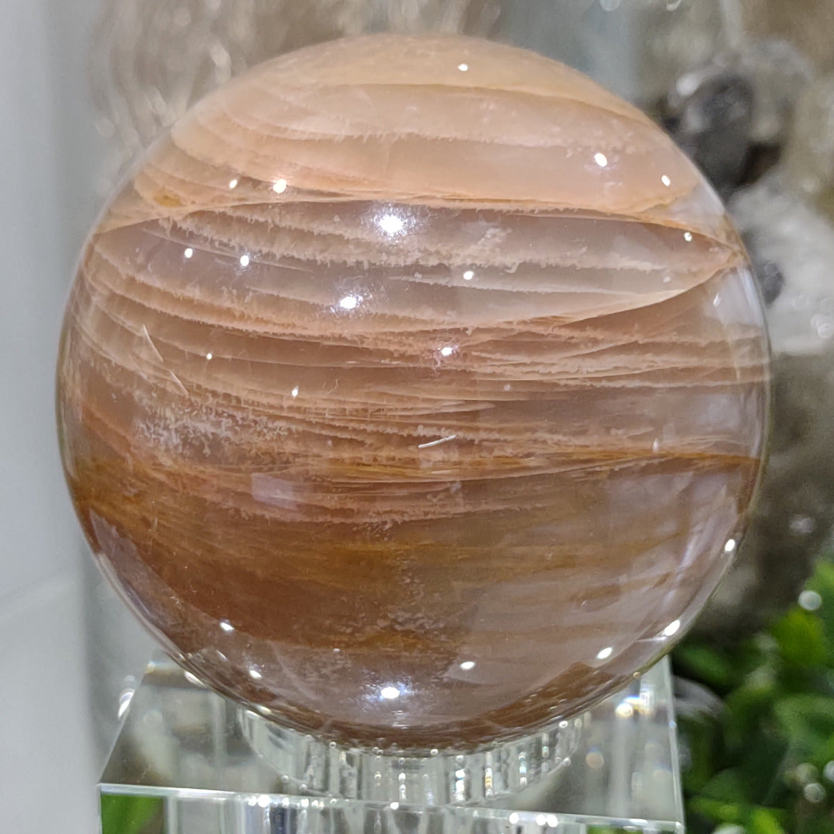 Peach Moonstone Sphere with ball of thread pattern (7.4cm) - 541g