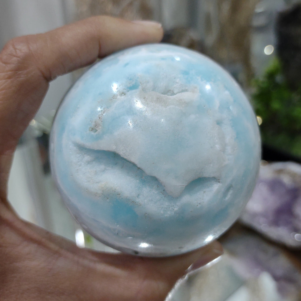 Caribbean Blue Calcite Sphere with deep stunning cavities (7.1cm) - 457g